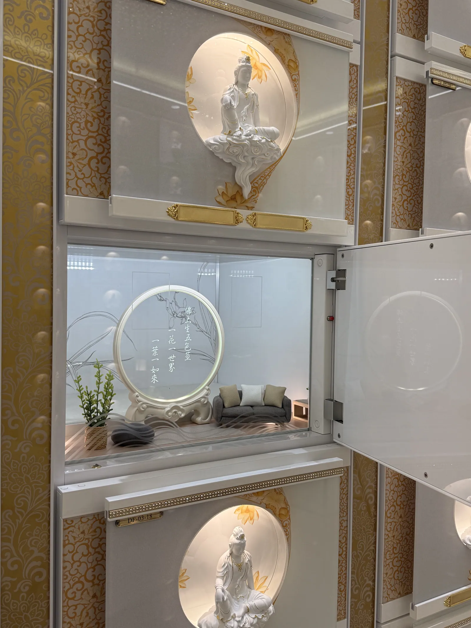 An opened niche with a mirrored interior and small keepsakes