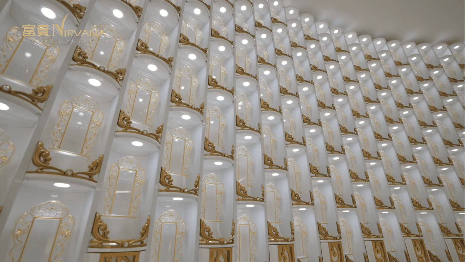 A close view of pale memorial tablets set in rows
