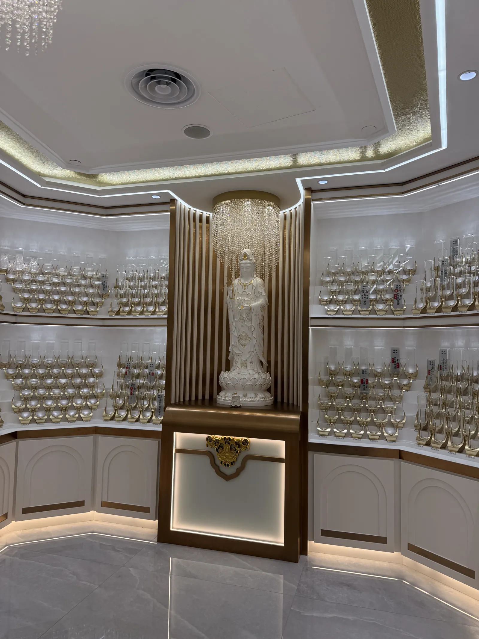 An ancestral tablet hall centred on a white Guanyin statue